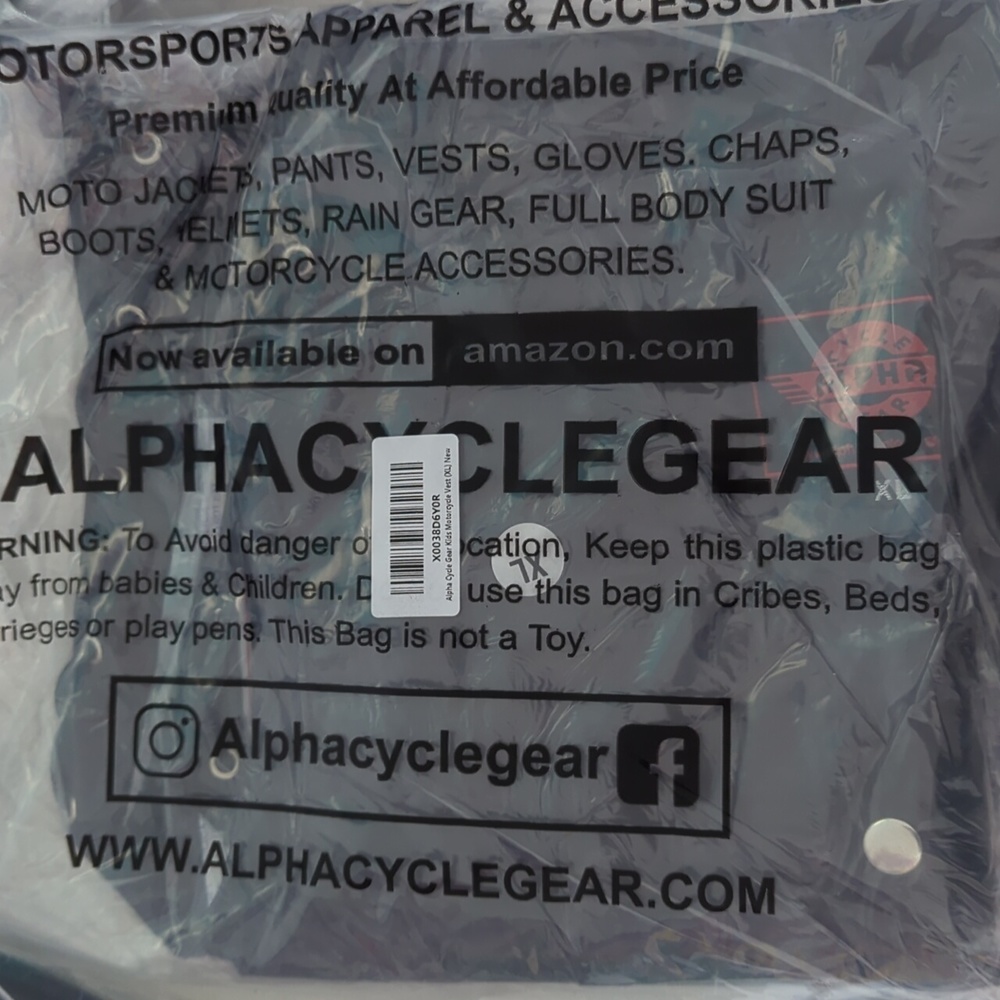 Alpha cycle gear kids motorcycle vest size XL black in color